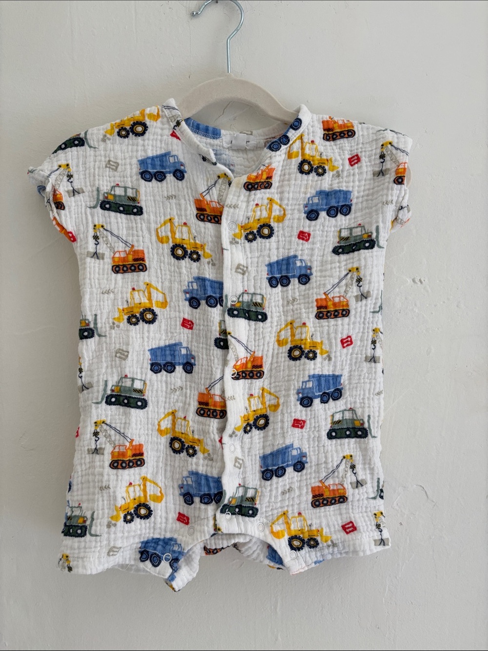 Angel Dear White Muslin Romper with Yellow, Blue, Orange and Green Trucks